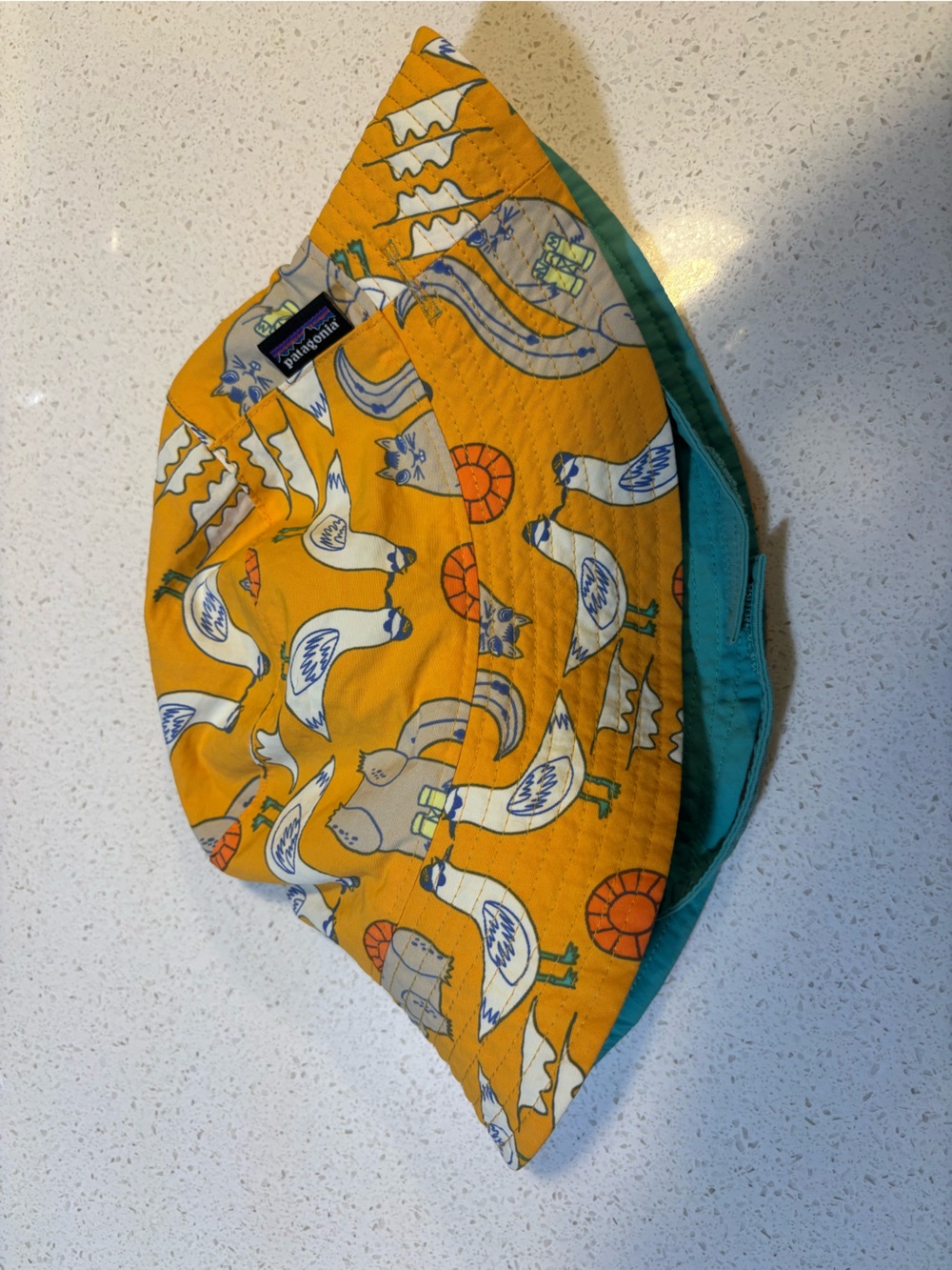 Patagonia Reversible Kids Sun Bucket Hat in Yellow with Teal Lining